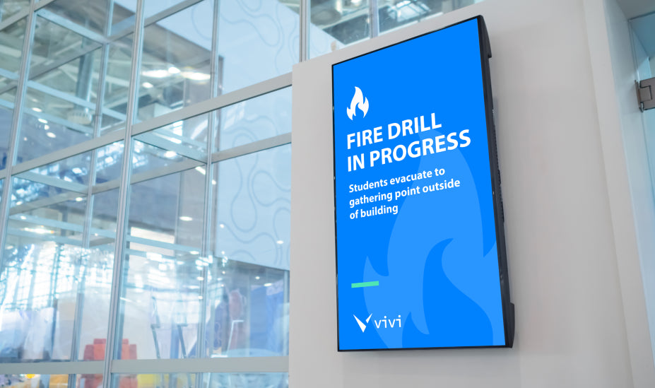 Display board in a school giving announcement about fire drill